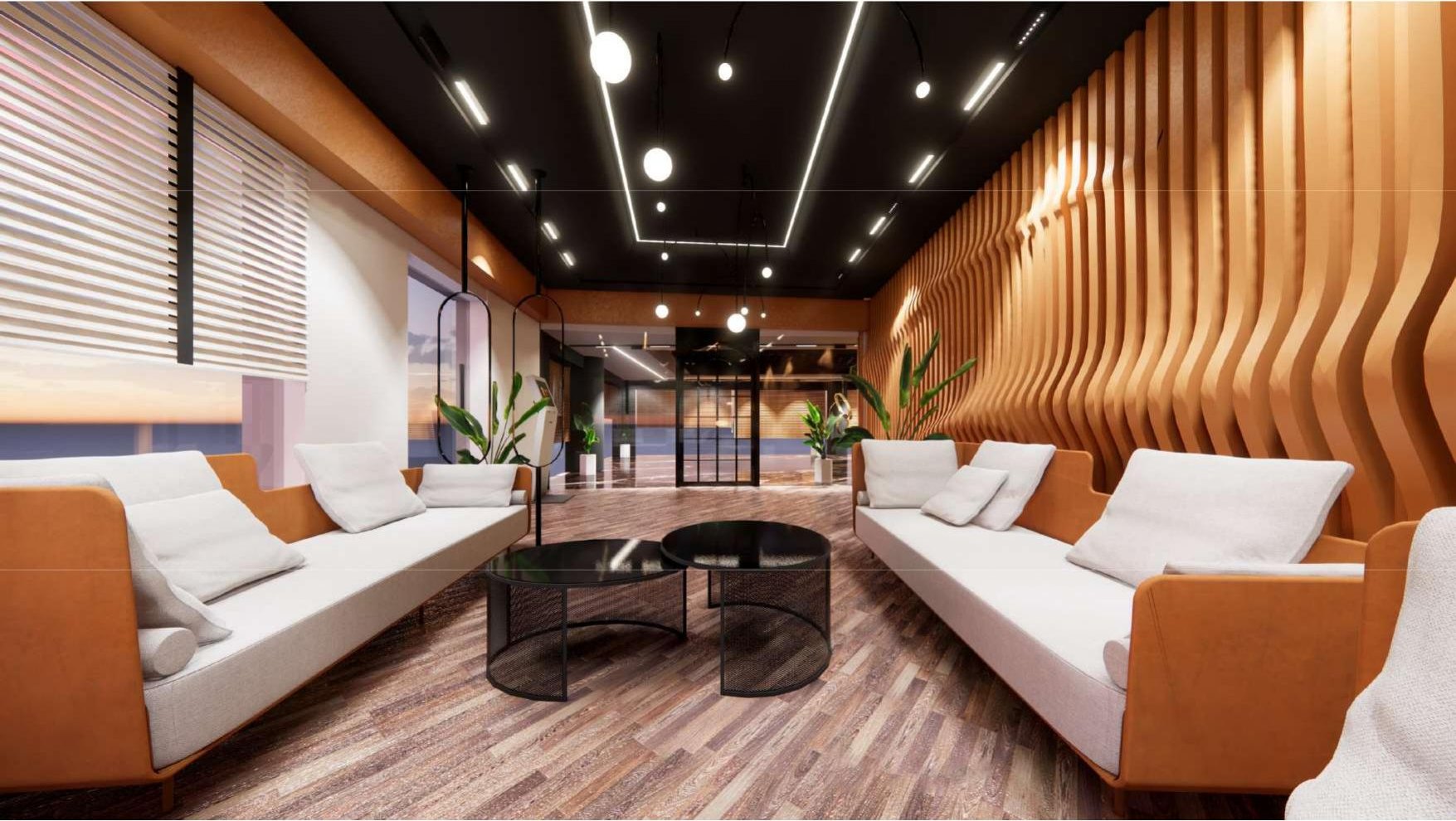 Studio Noorhaus entrance lounge with fluted timber wall, tan sofas and linear lighting